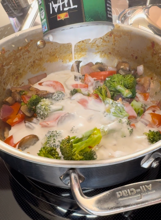 Adding the coconut milk