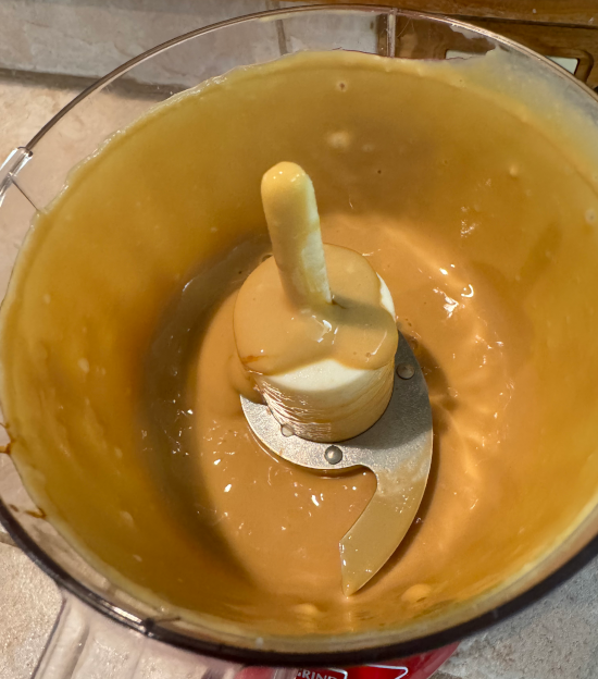 Silken tofu and molasses combined in food processor