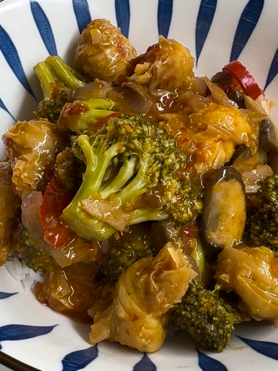 Sticky orange tofu knots served before toppings added