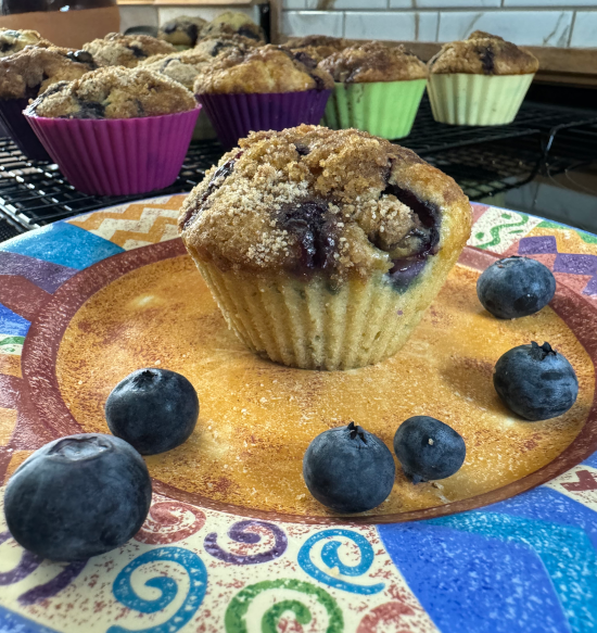 Blueberry muffin removed from cupcake liner