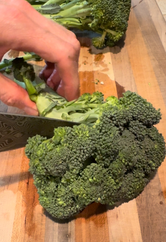 Chopping broccoli into florets