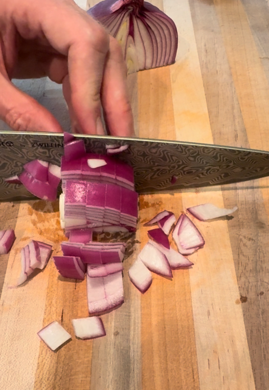 Chopping red onion