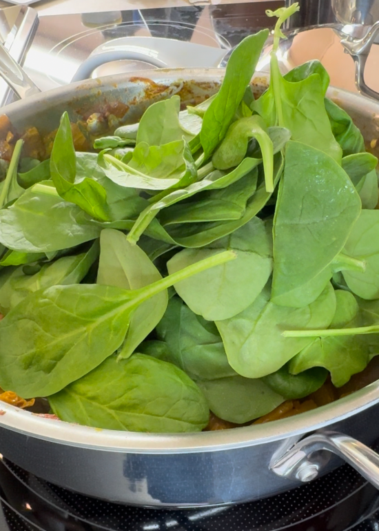 Spinach added to skillet