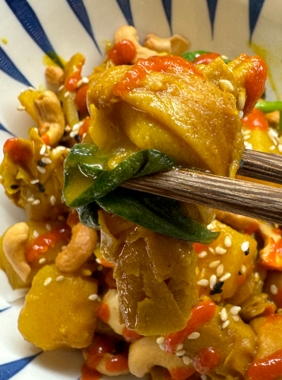 Yellow Curry Tofu Knots with Spinach, Potatoes, Carrots over Jasmine Rice