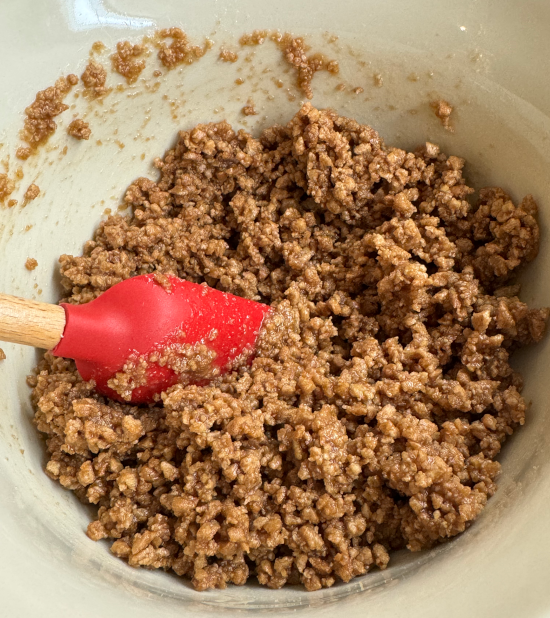 Graham crumbs and butter mixed together