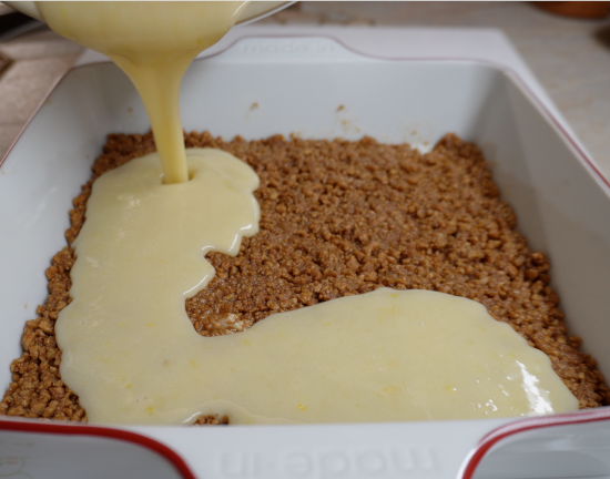 Lemon bar filling added to baking dish