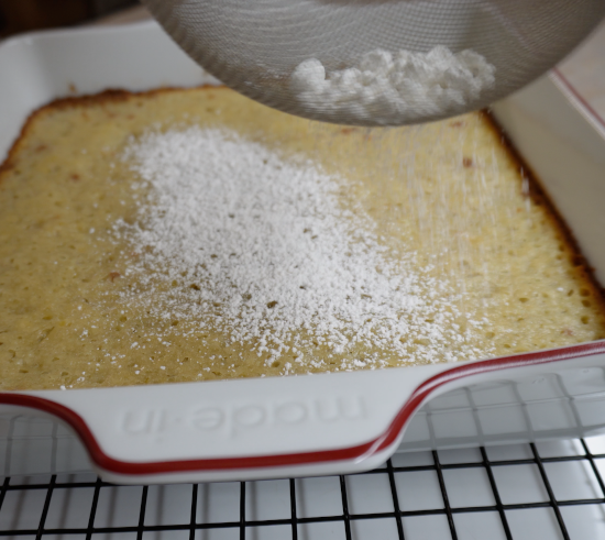 Sifting powdered sugar on top