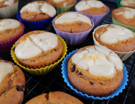 Cupcakes removed from baking pan and on cooling rack