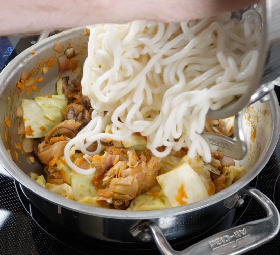 Adding cooked udon noodles