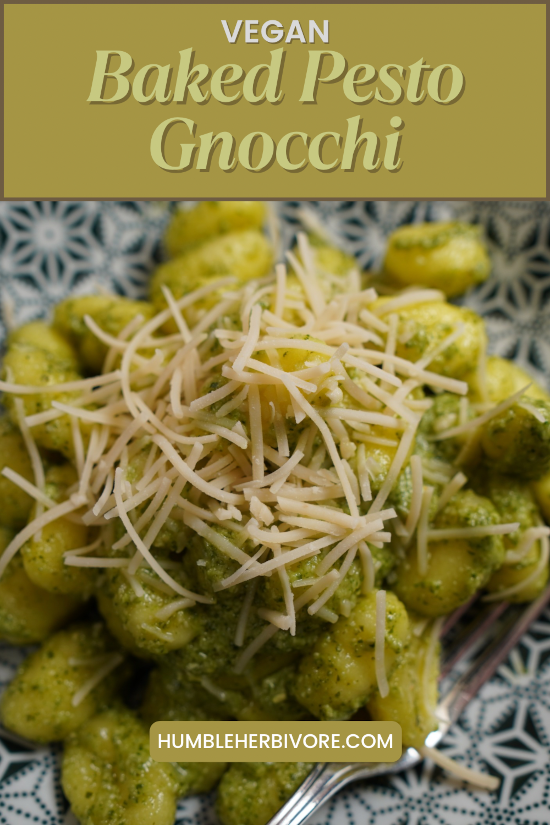 Baked pesto gnocchi topped with vegan parmesan