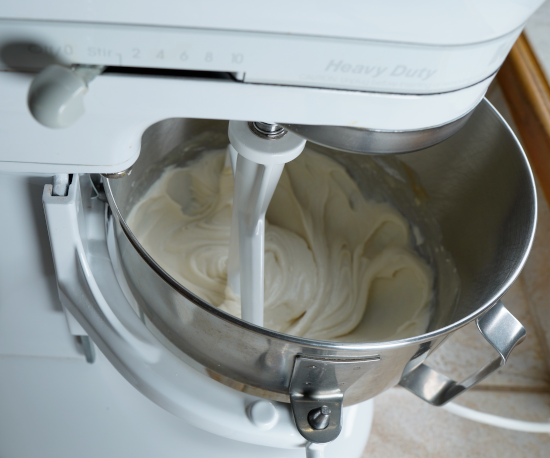 Using a stand mixer to combine the ingredients to make the filling