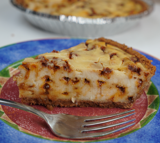 Vegan caramel chip cheesecake served with the pie in the background