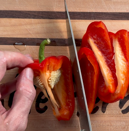 Chopping red bell pepper