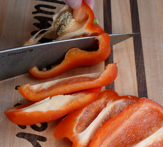 Slicing red bell pepper