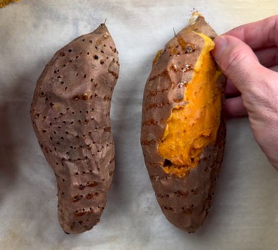 Once cooled, peel the skin from the sweet potatoes