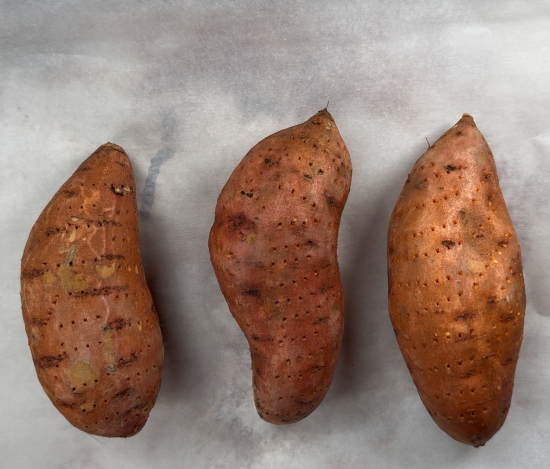 Pierce the sweet potatoes with a fork before baking