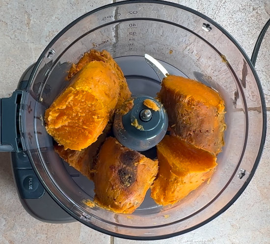 Place the peeled sweet potatoes in the food processor