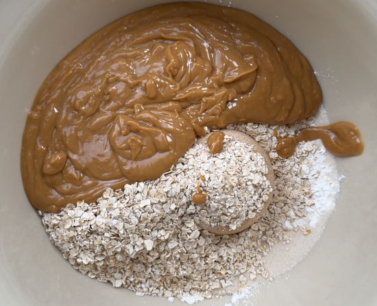 Wet and dry ingredients added to the mixing bowl