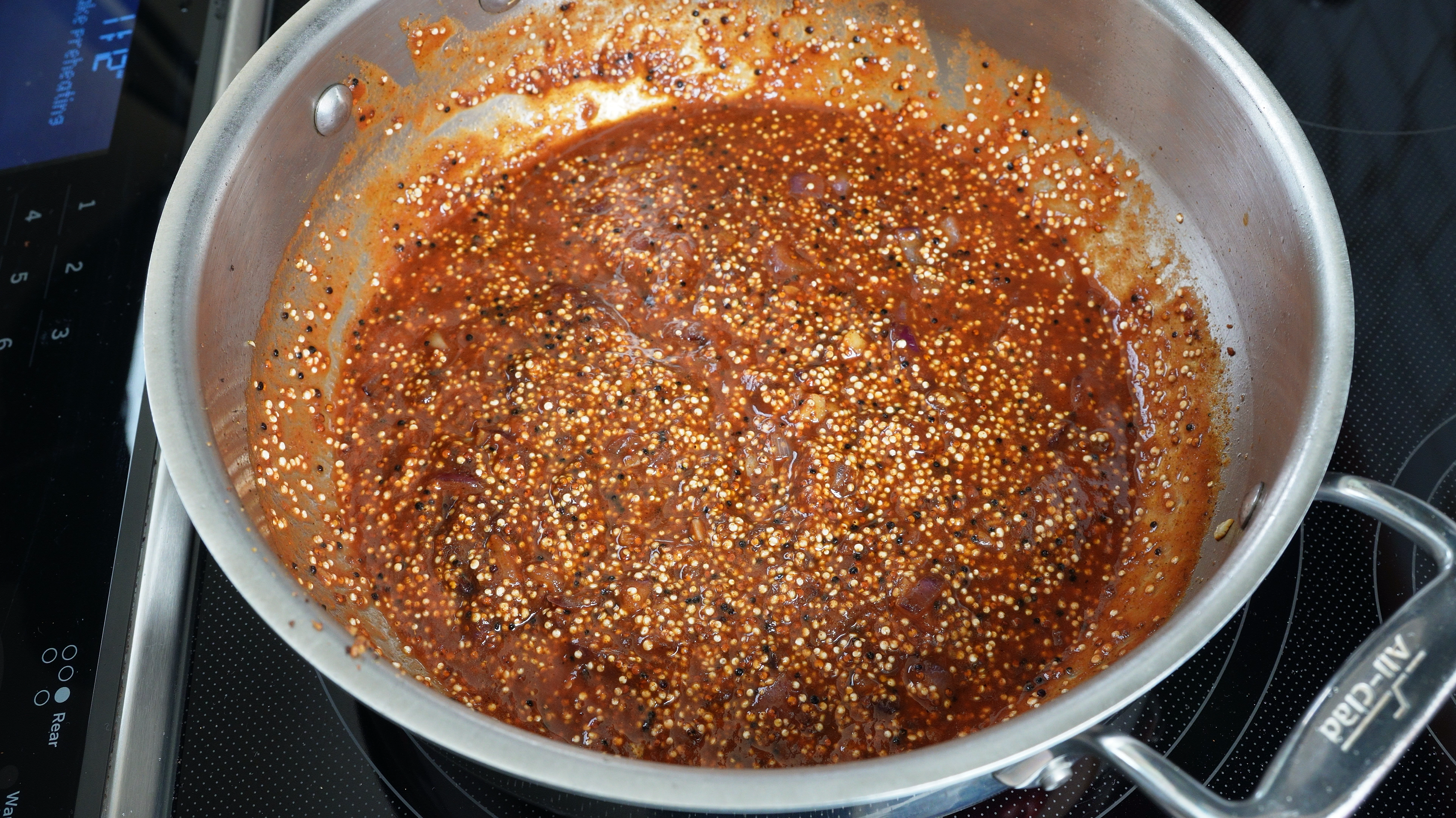 Cooking the quinoa filling in the skillet