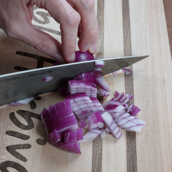 Chopping red onion