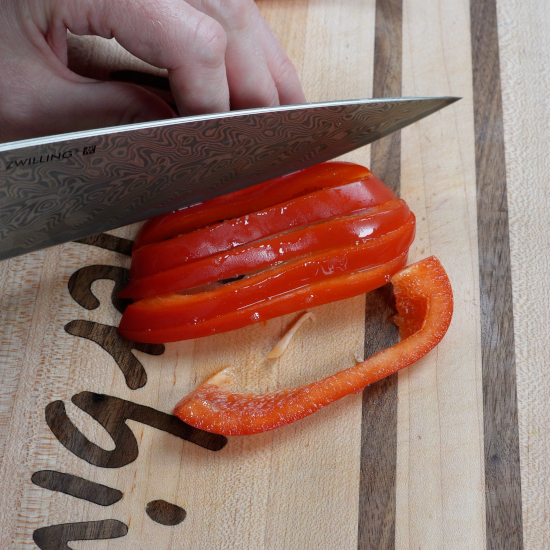 Slicing red bell pepper