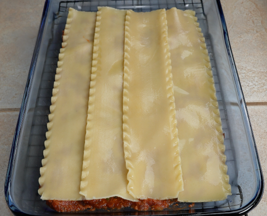 Noodles added to the baking dish