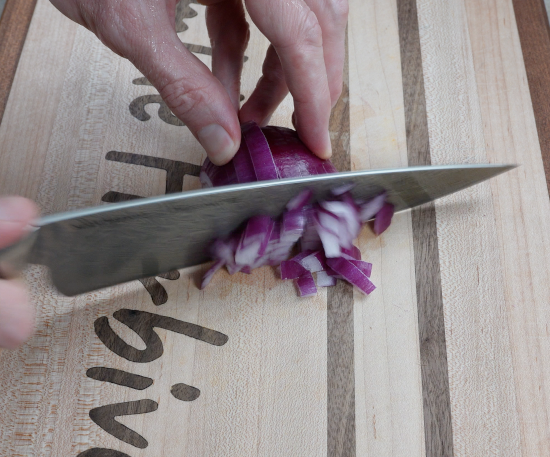 Chopping red onion