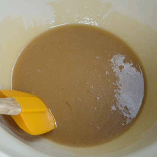 Wet ingredients with sugar are combined