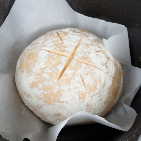 Loaf in Dutch oven ready to bake