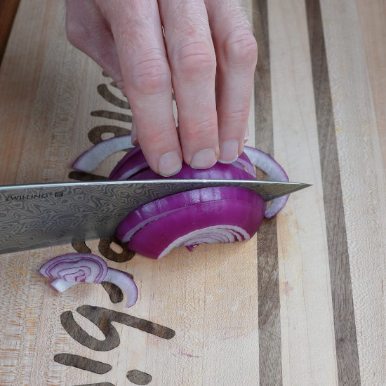 Chopping red onion