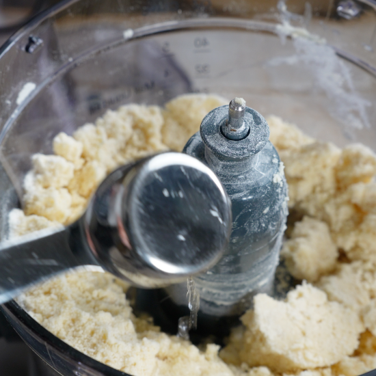 Adding ice water to the dough