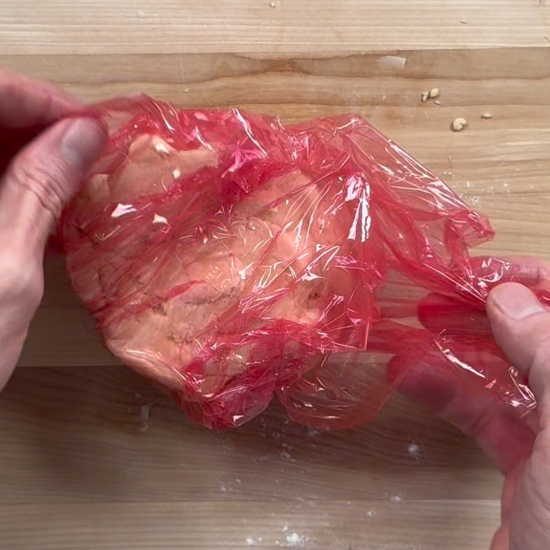 Cover the dough in plastic wrap and then let rest in the refrigerator for an hour. 