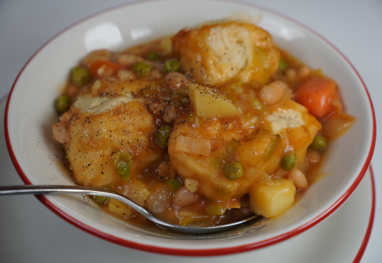 Vegan leek and bean casserole with biscuits