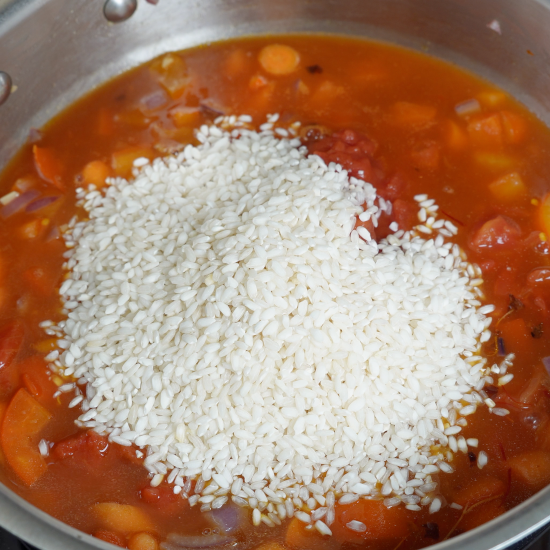 Added the arborio rice to the skillet