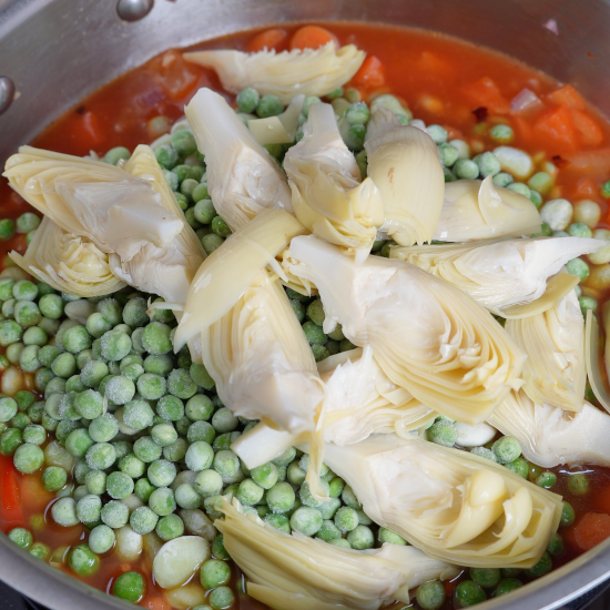 Artichoke hearts added to the paella