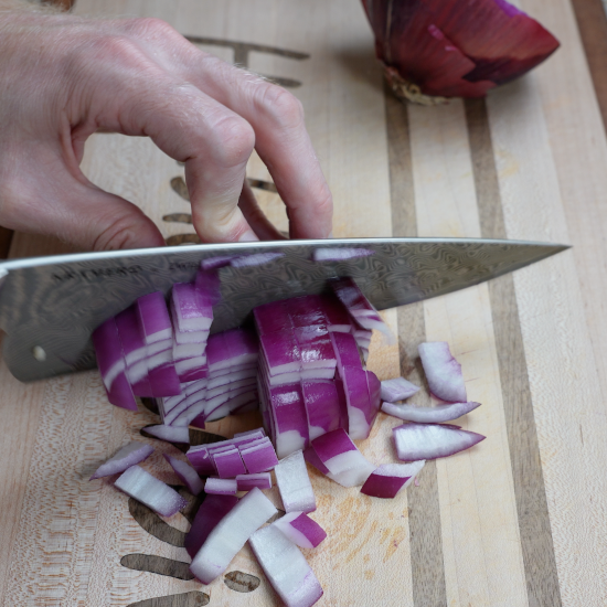 Chopping red onion