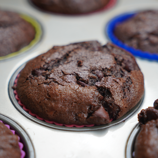 Close up of a cupcake fresh from the oven still in the cupcake pan