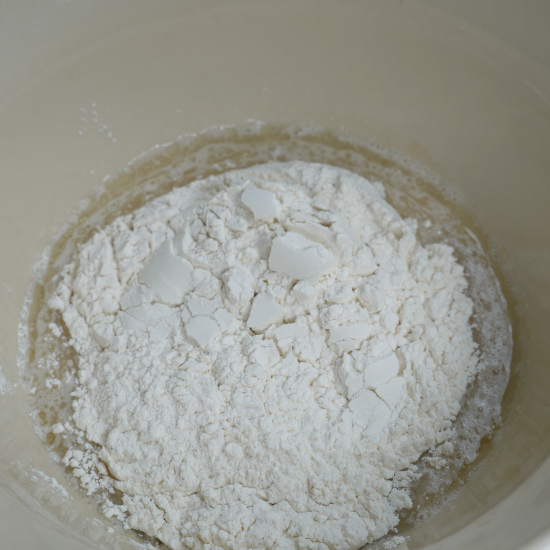 Flour added to the mixing bowl