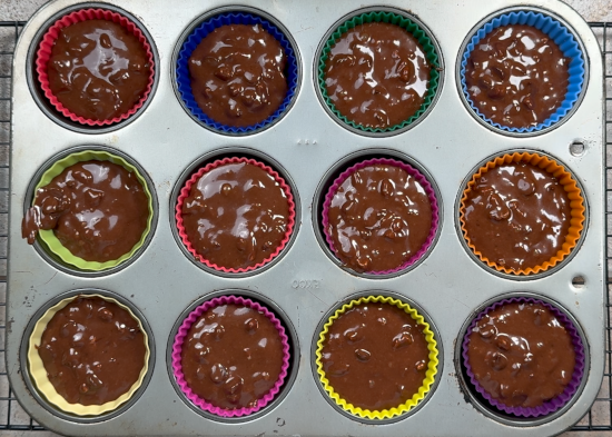 Filled cupcake liners ready to bake