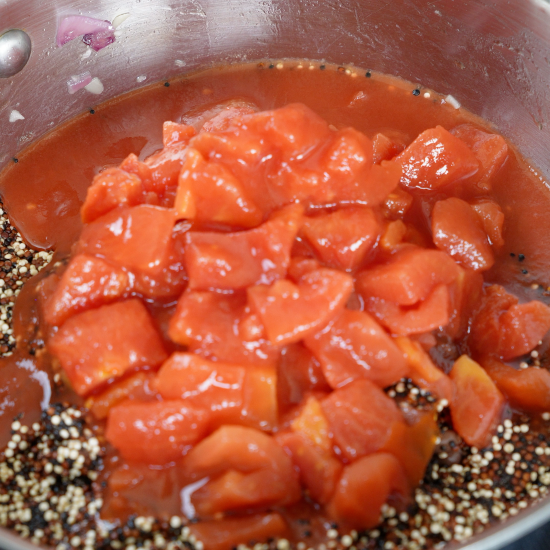 Added the diced tomatoes to the pan