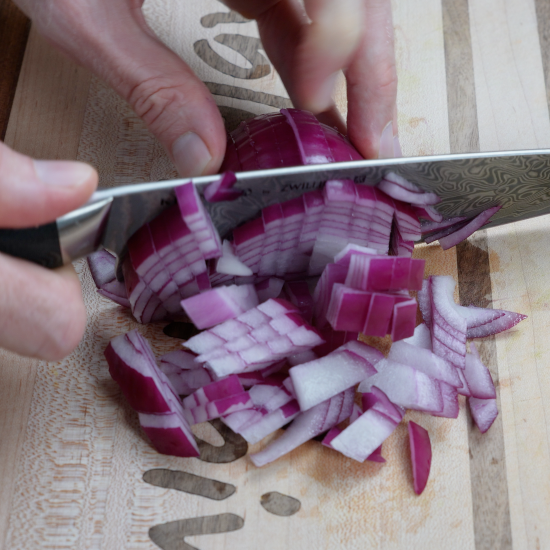 Chopping red onion