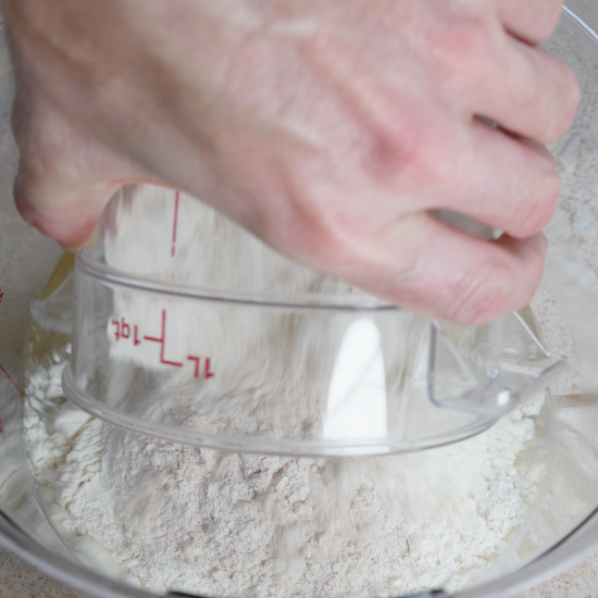 Dry ingredients added to the storage container. 