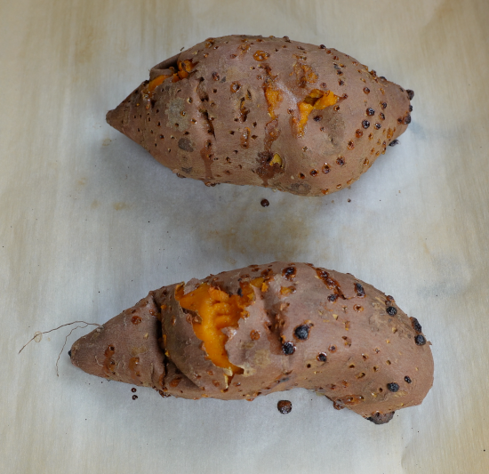Baked sweet potatoes fresh from the oven. 